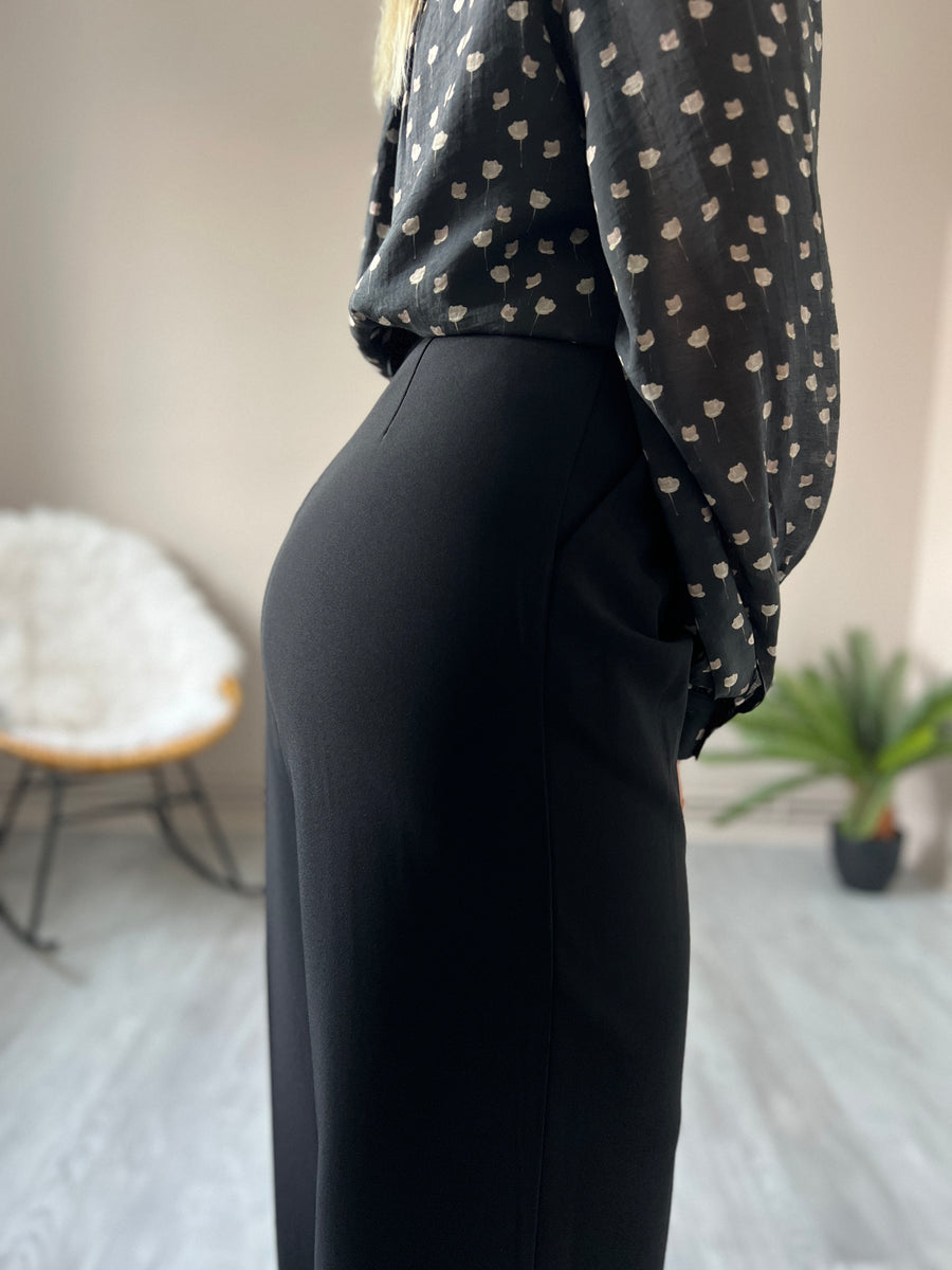 LE PANTALON A PINCE NOIR