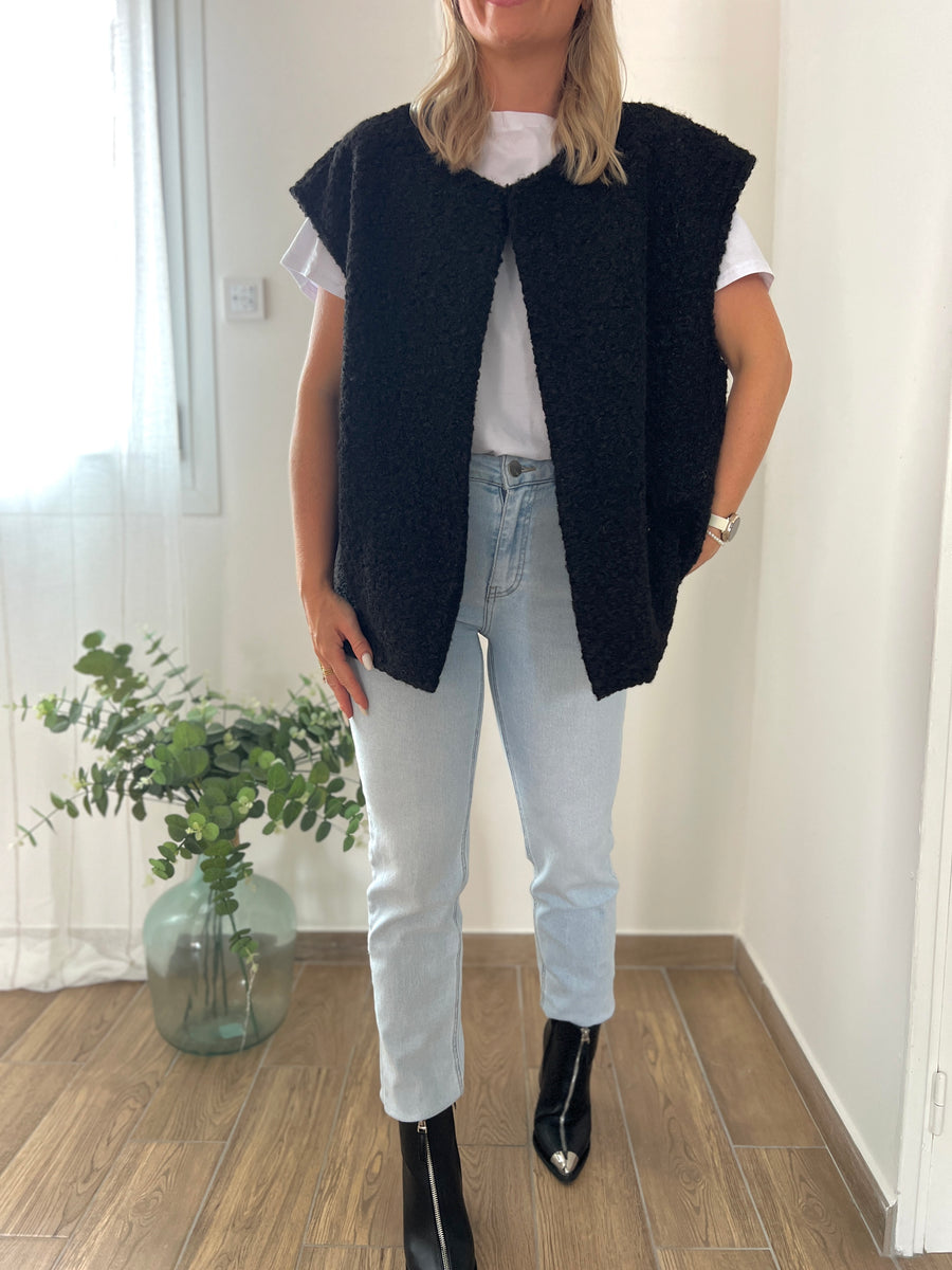 LA VESTE SANS MANCHE NOIRE