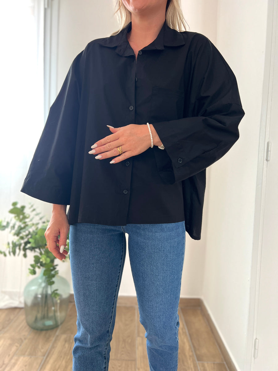 LA CHEMISE BASIQUE ÉVASÉE NOIRE